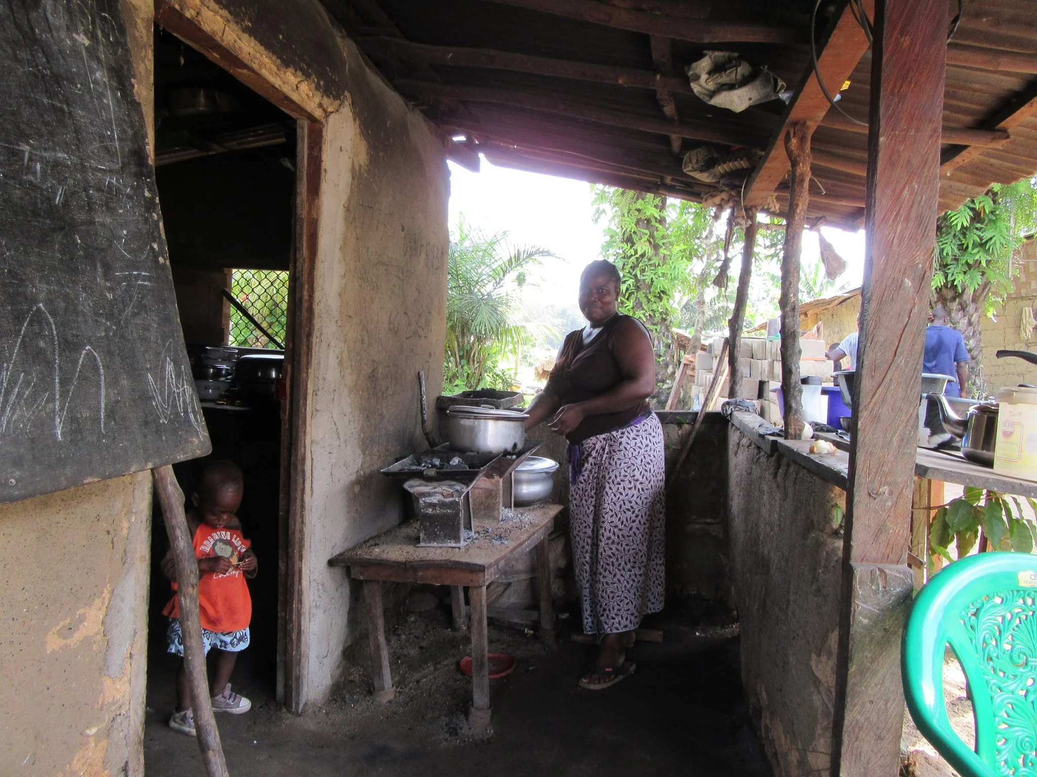  Lucy working in her kitchen preparing a meal