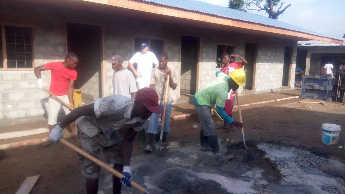 Cement mixed by hand for floors and porch outside