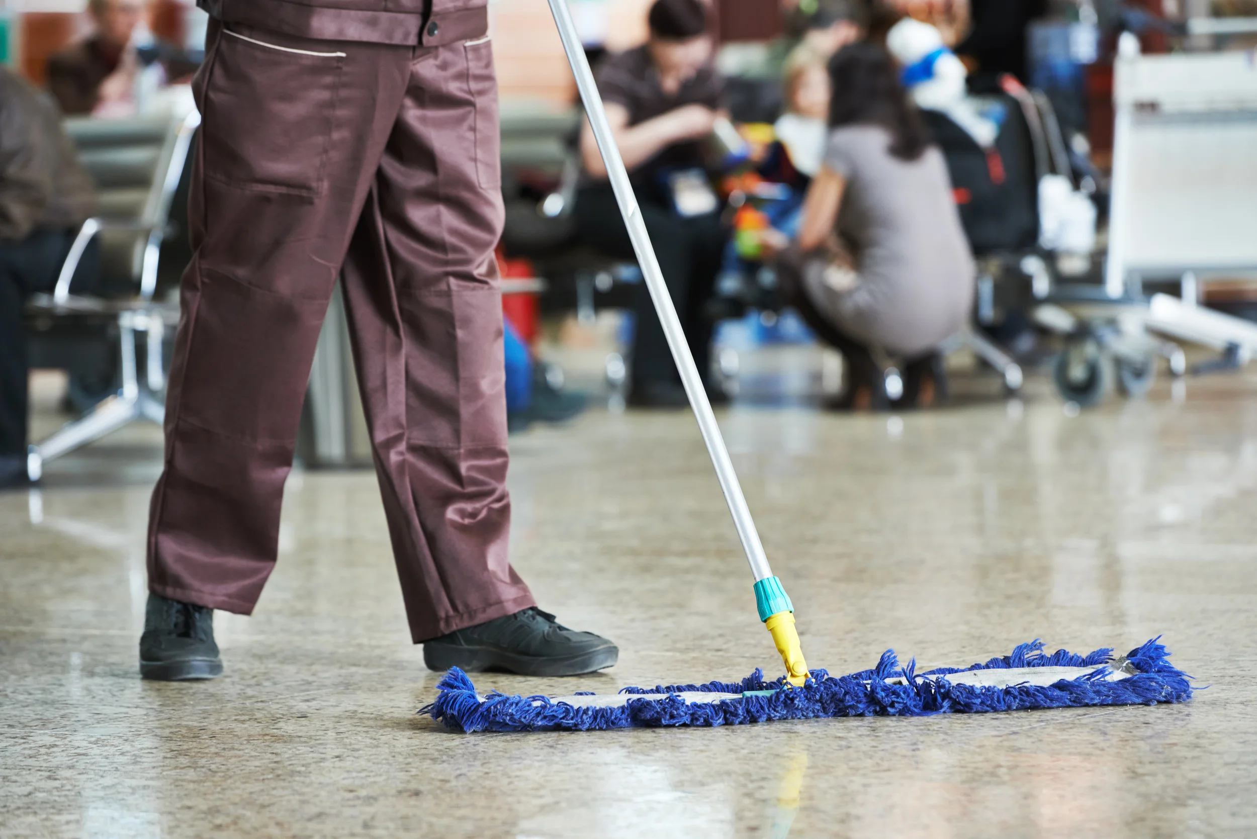 stock-photo-cleaner-with-mop-and-uniform-cleaning-hall-floor-of-public-business-building-164713328 (1).jpg