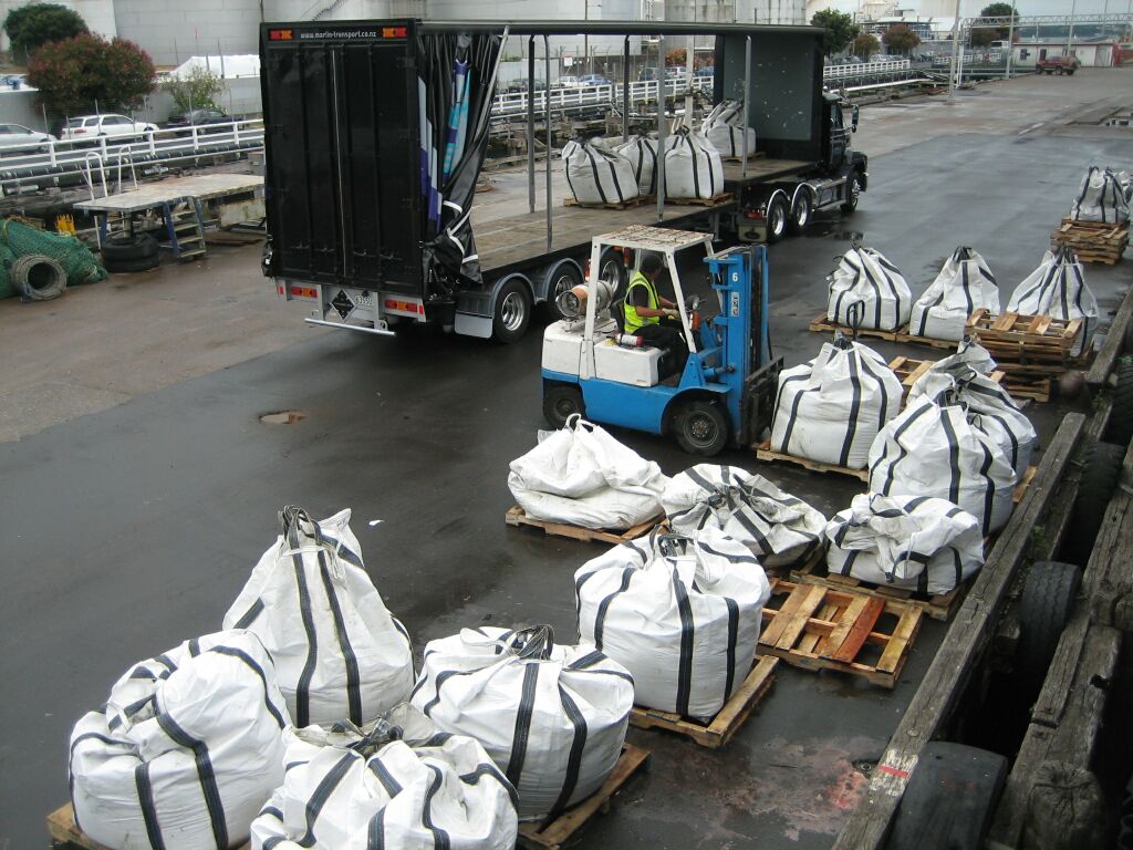 large_sample_bags_being_lifted_into_truck_for_transport_to_warehouse1.jpg