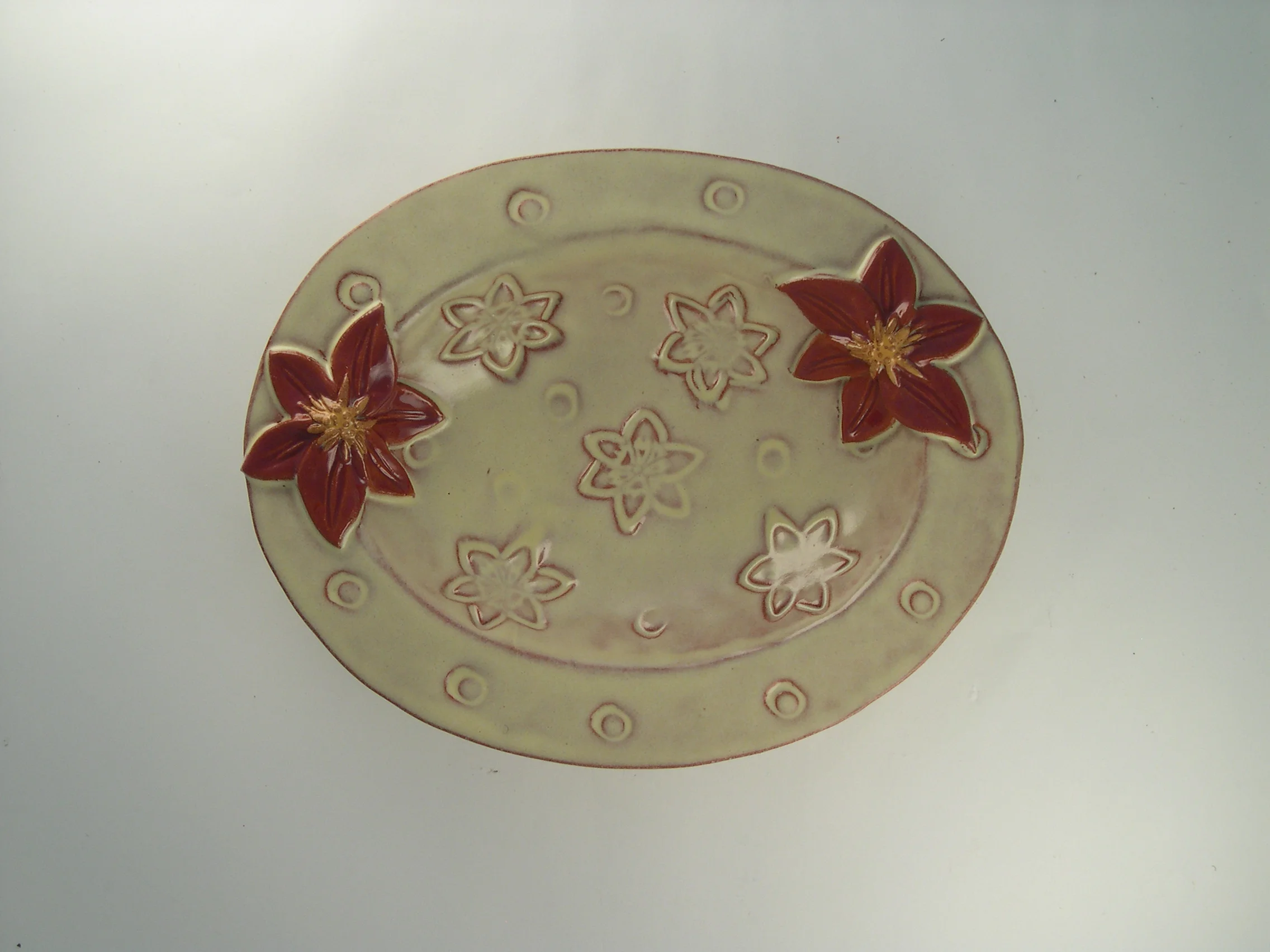 Oval dish with Flowers 7"x5.5"x1.5"  $42.00