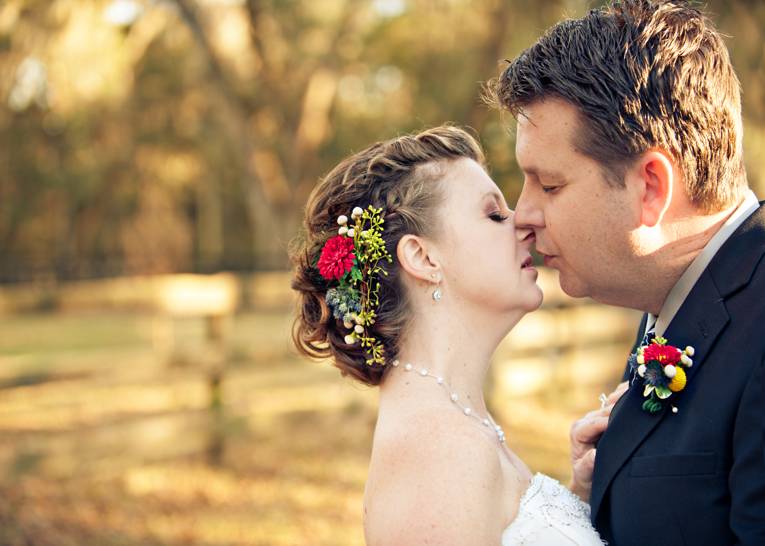 Bride and Groom kiss during their ceremony at their rural ceremony in Florida.jpg