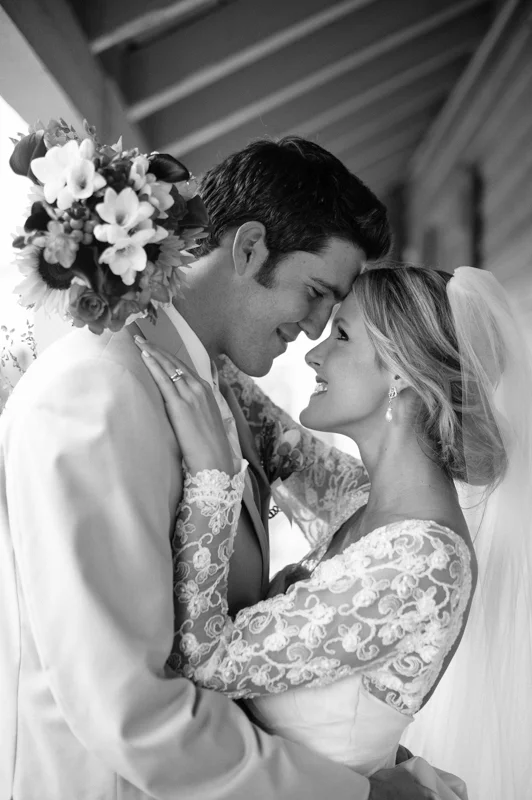 bride and groom embrace right after their ceremony at the Villa Blanca at the White Room in St. Augustine, Florida