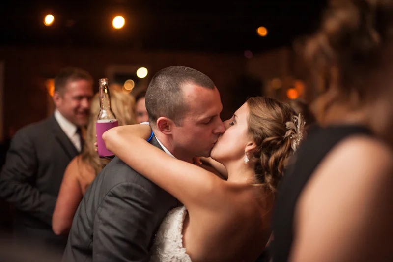 bride and groom kiss on the dance floor at the White Room in St. Augustine, Florida