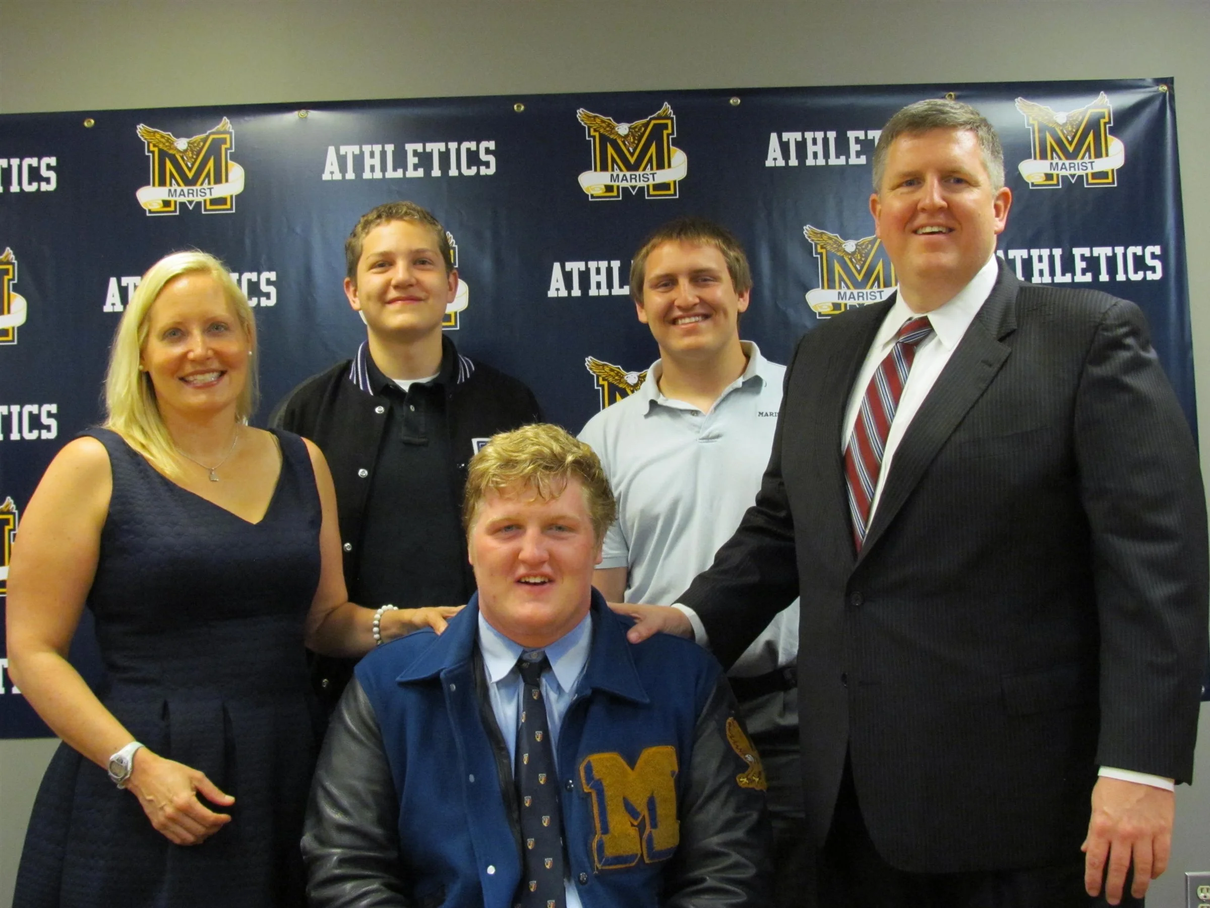 Incoming freshman offensive lineman Jack Trainor and his family during the his high school's signing day festivities earlier this year. Photo Credit - Marist School