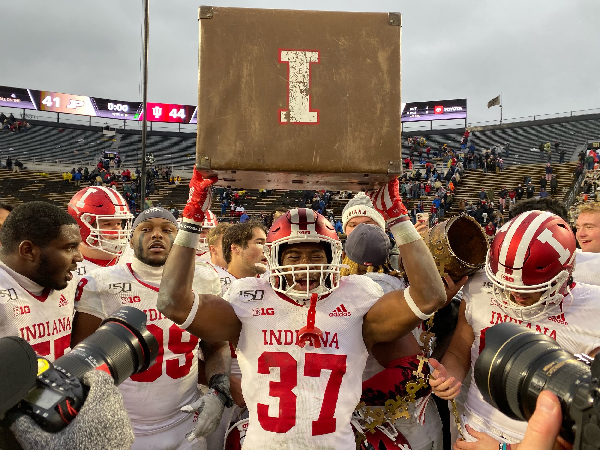  Redshirt sophomore running back Ahrod Lloyd carries the suitcase which held the Old Oaken Bucket after the Hoosiers’ 44-41 victory in double overtime.&nbsp; 