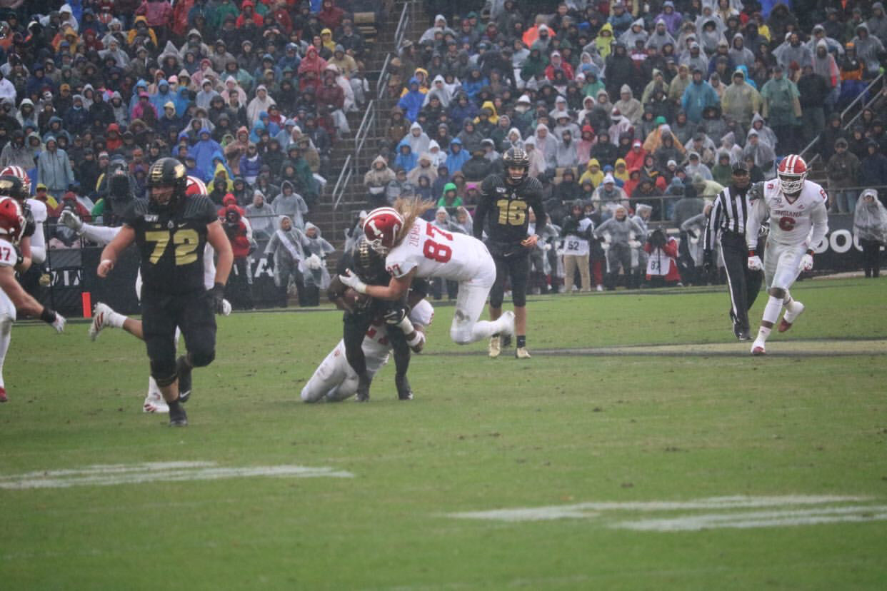  Junior DL Michael Ziemba dives on a stop to help the Hoosiers ahead of the Boilermakers in their rainy day, 44-41 double overtime Oaken Bucket victory.&nbsp; 
