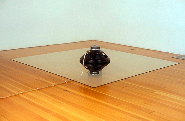 Fantastic Gratifications of Being Cured All Right, 2004, Subwoofers, glass, wood, electronic components, 15 x 60 x 60 inches