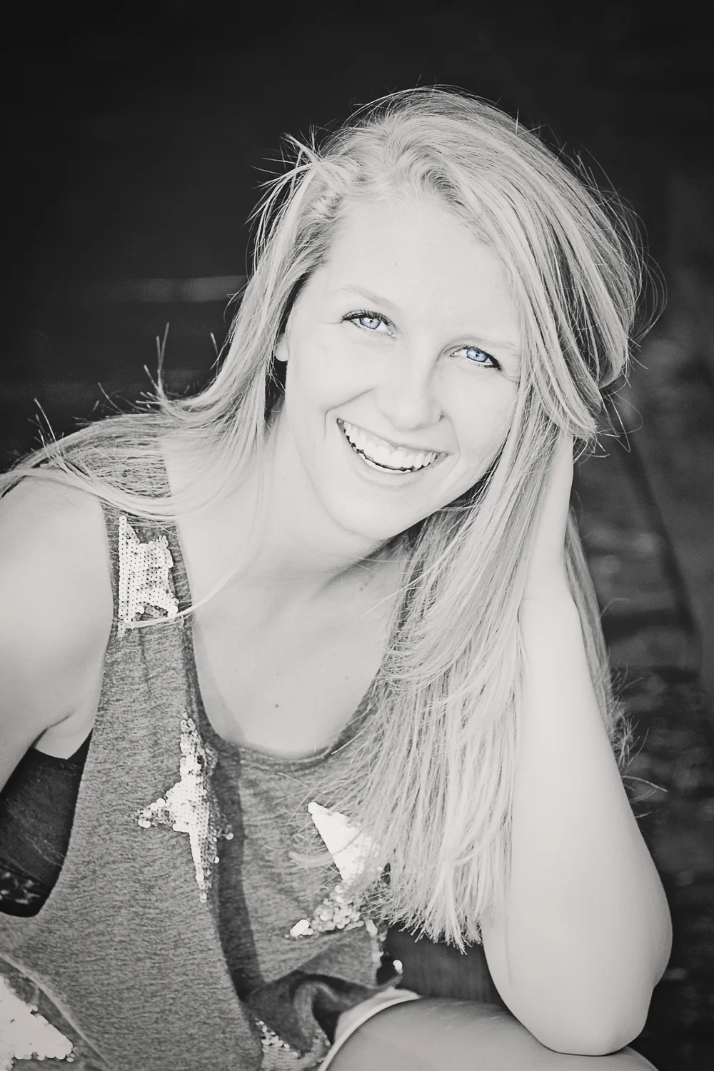 Kirsten looked fabulous at her summer session. For this image we framed her in the doorway of an old barn and used a reflector to bounce the natural sunlight back on her face. 