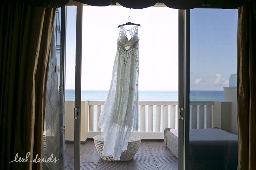 Scariest moment of photographing a wedding dress... beach + wind + gusts of wind + terrace + open doors = scary..... but awesome shot!