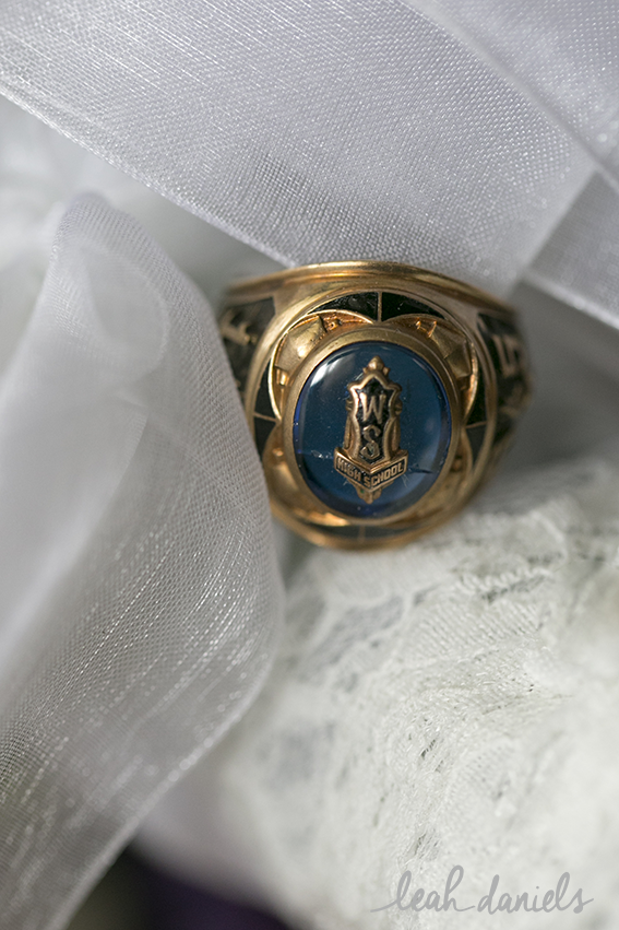 The bride had her father's high-school ring attached to her bouquet to keep him with her all day.