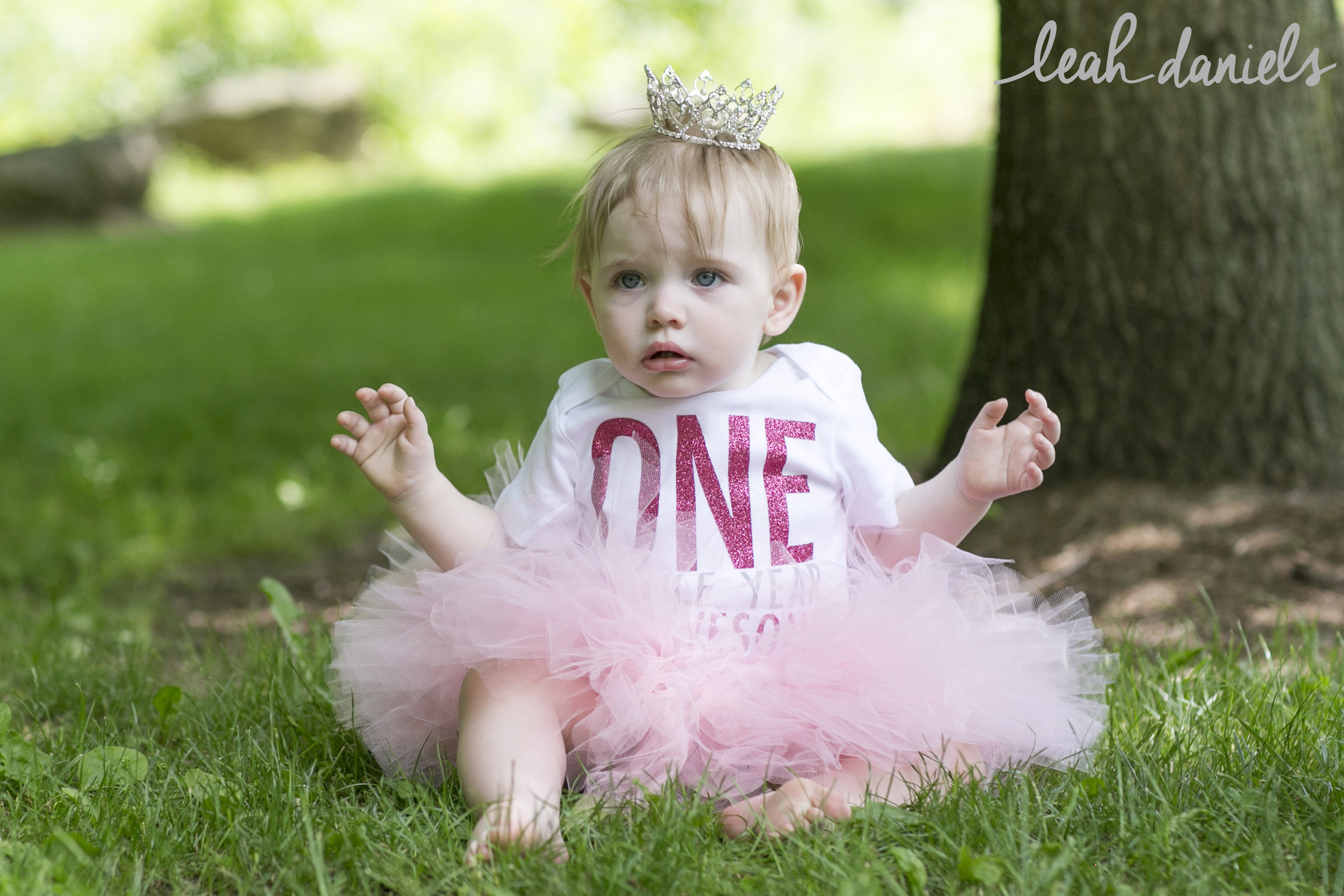 The face you make when you're really not sure why Mom and the photographer did this to you :)