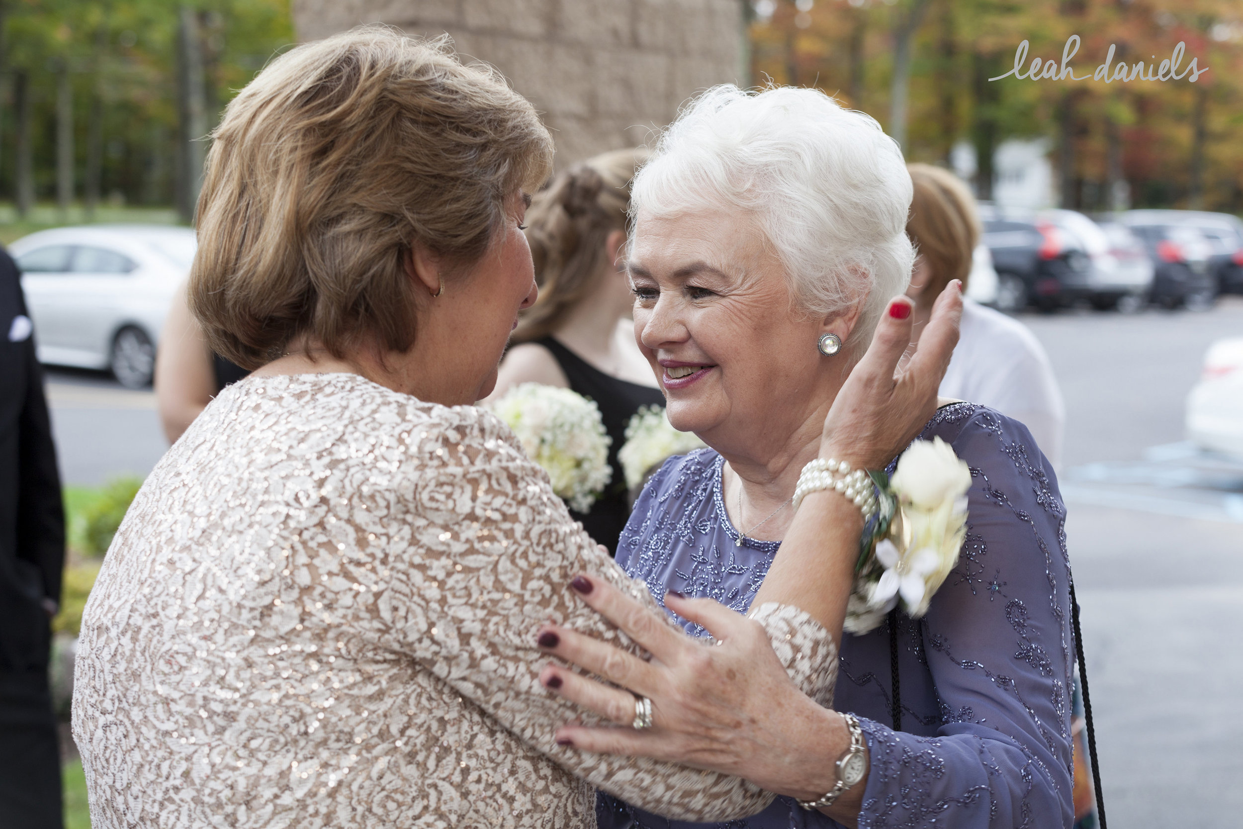 An absolutely beautiful moment between the Bride and Groom's Mothers <3