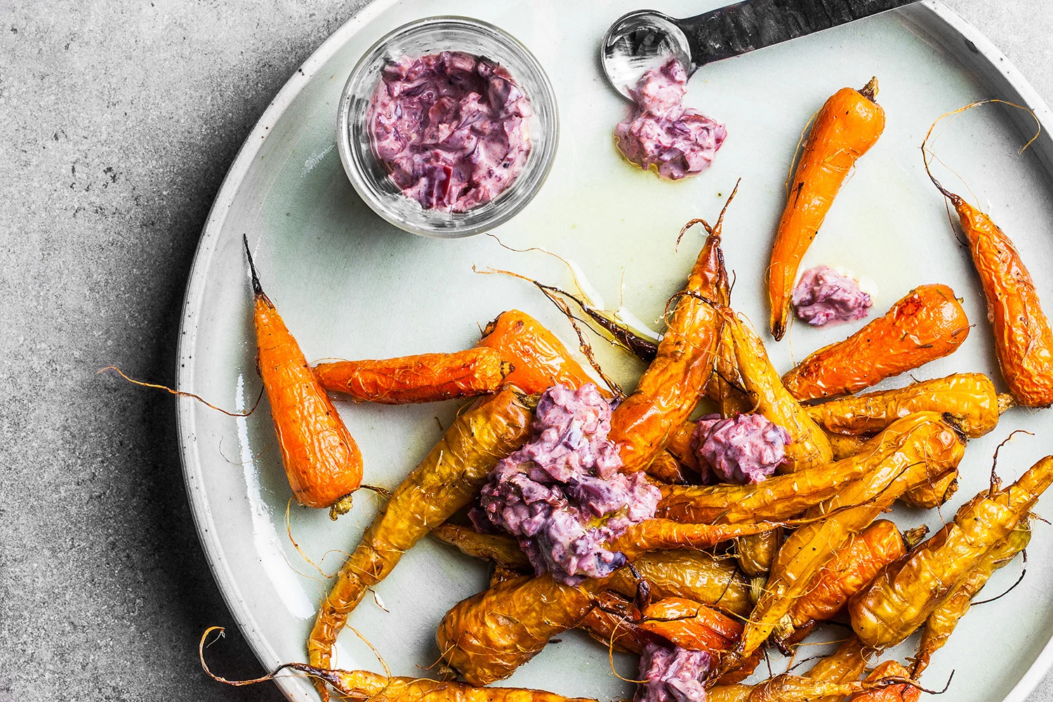 Roasted Carrots w/ Kalamata Olive Sauce. Recipe and styling by Cle-ann , photo by Hugh Adams .