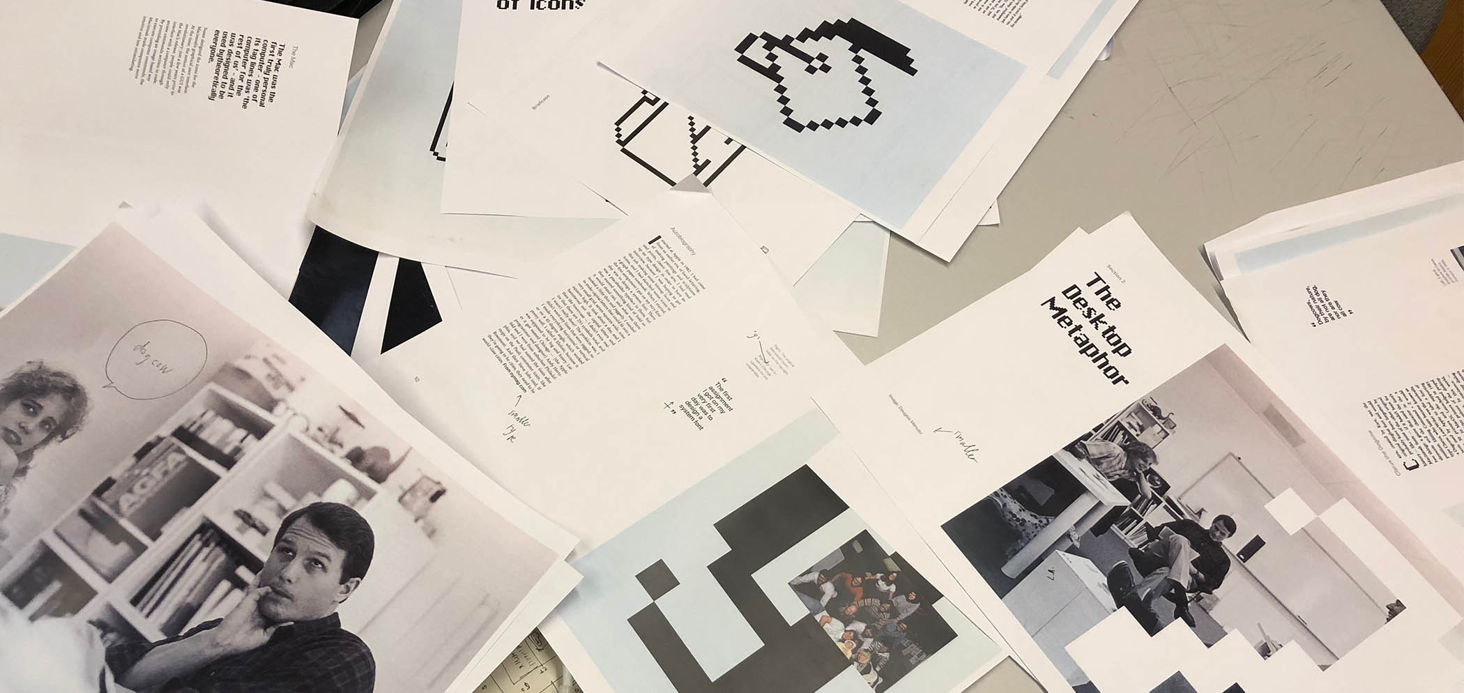 Lots of test prints being inspected and annotated