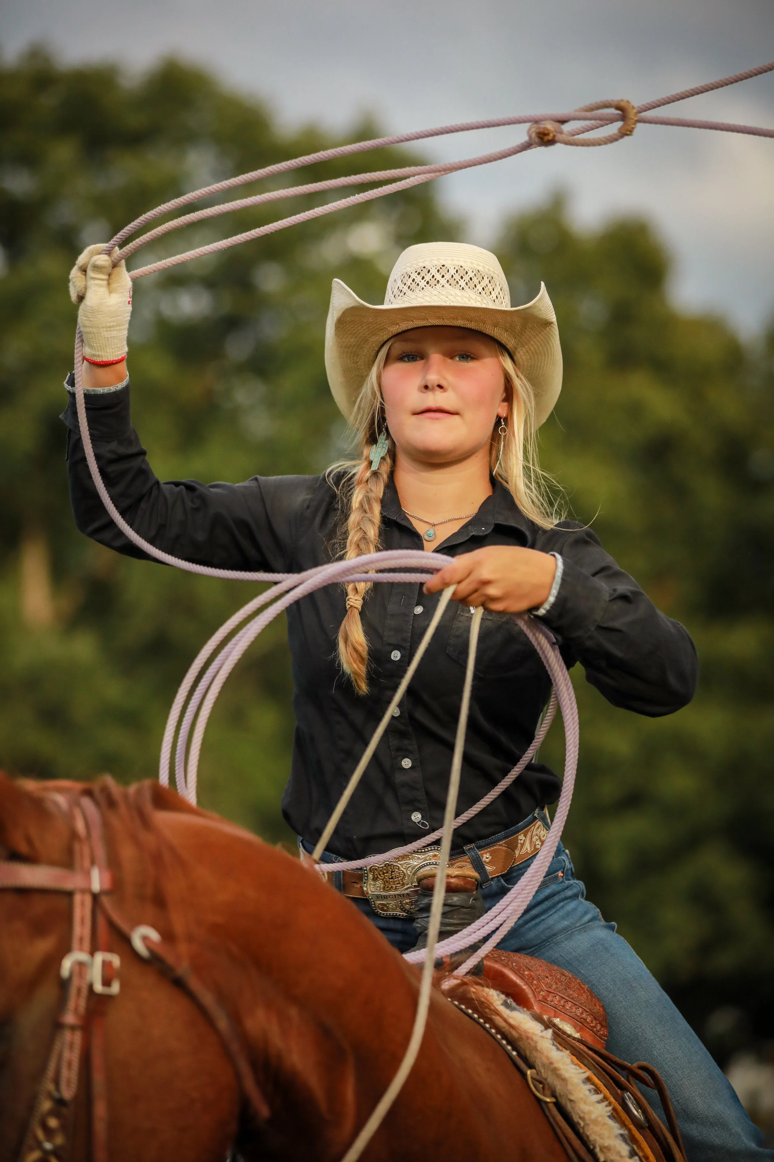 Hannah Revere, 15, poses for a portrait before competing in a rodeo event at Rocky Oak Farm in Powhatan, VA.