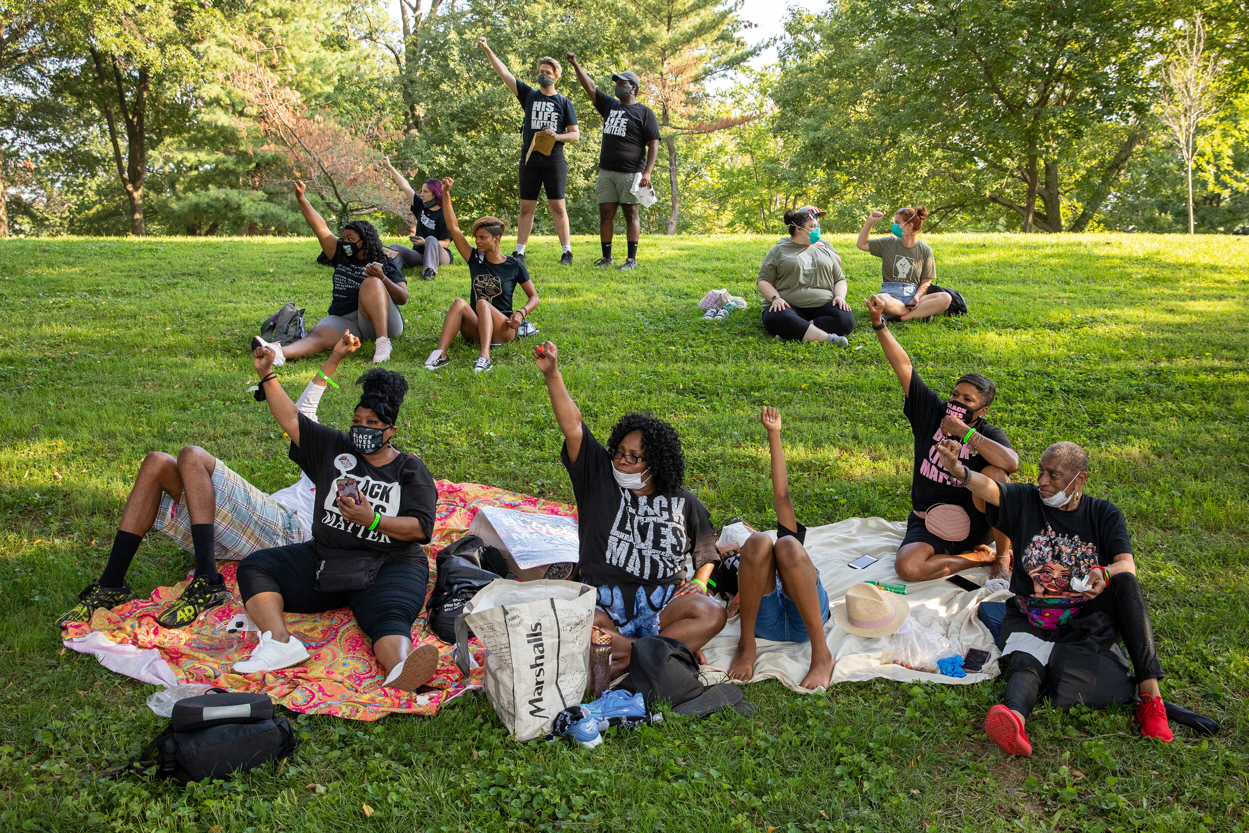 Protestors raise their fists at the “Get Your Knee Off Our Necks” March on Washington in Washington, D.C., U.S. on Friday, August 28, 2020. (Photo made for Bloomberg)