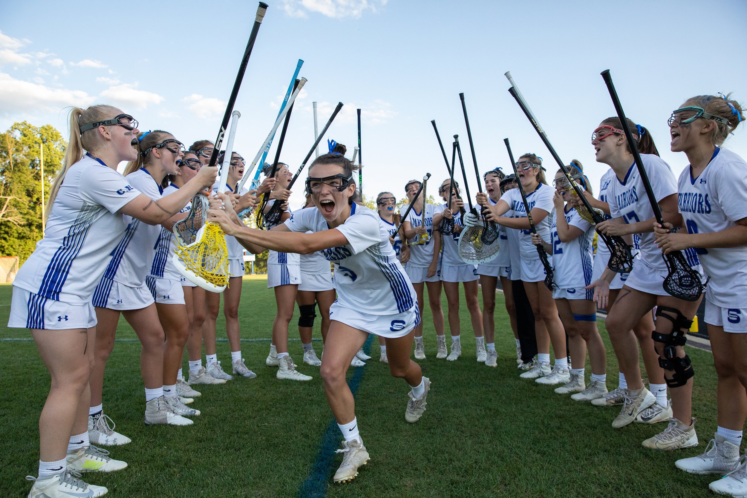 Greer Cohen, a member of the Sherwood High School lacrosse team, takes the field before the Maryland state semifinal lacrosse match at Sherwood High School in Silver Spring, Maryland, on Wednesday, June 16, 2021. (Amanda Andrade-Rhoades/For The Wash
