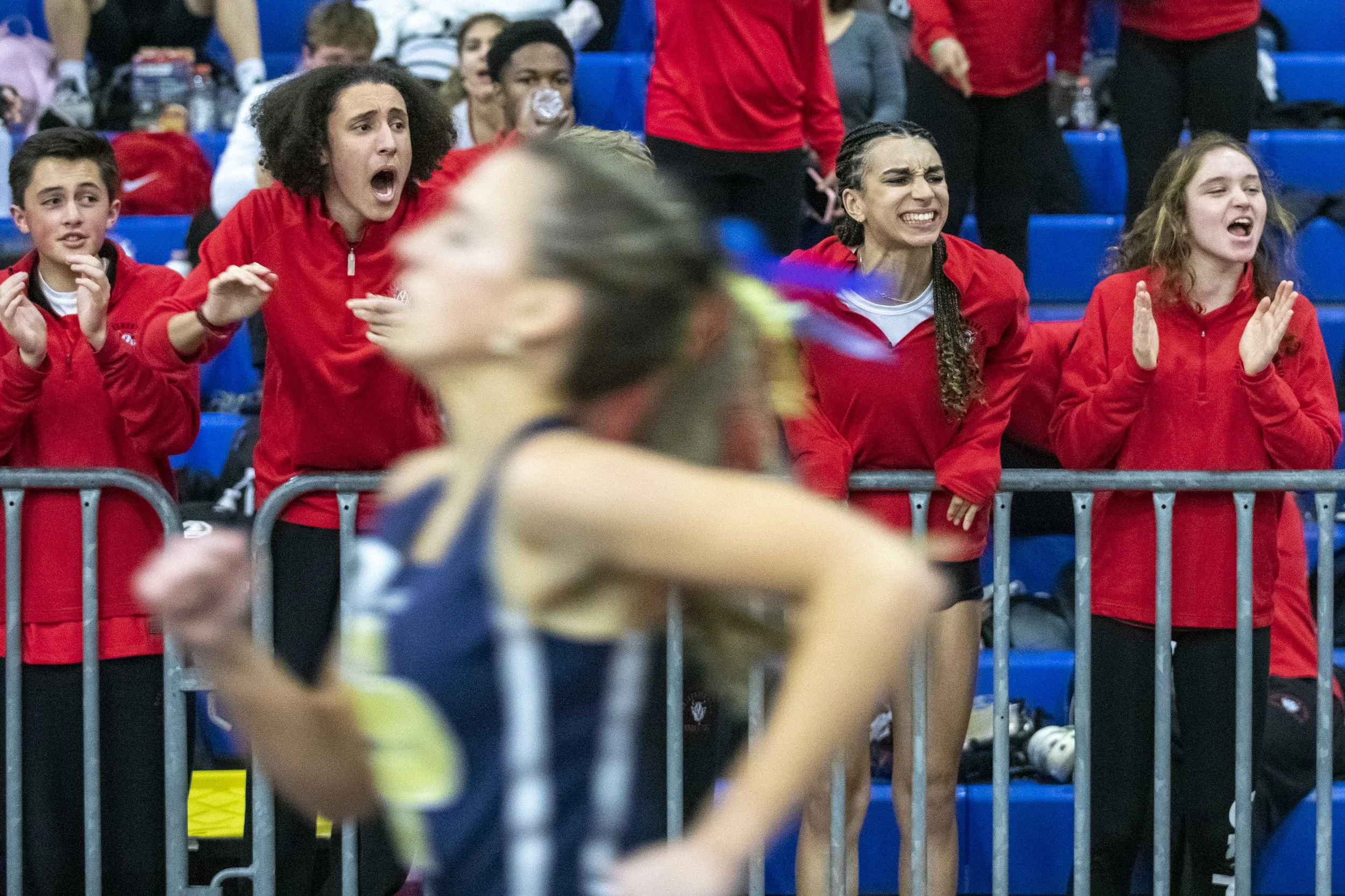  Spectators yell during a race at the Maryland 3A and 4A track and field championships, hosted at the Prince George's Sports and Learning Complex in Landover, Maryland, on February 22, 2023. (Amanda Andrade-Rhoades/For The Washington Post) 