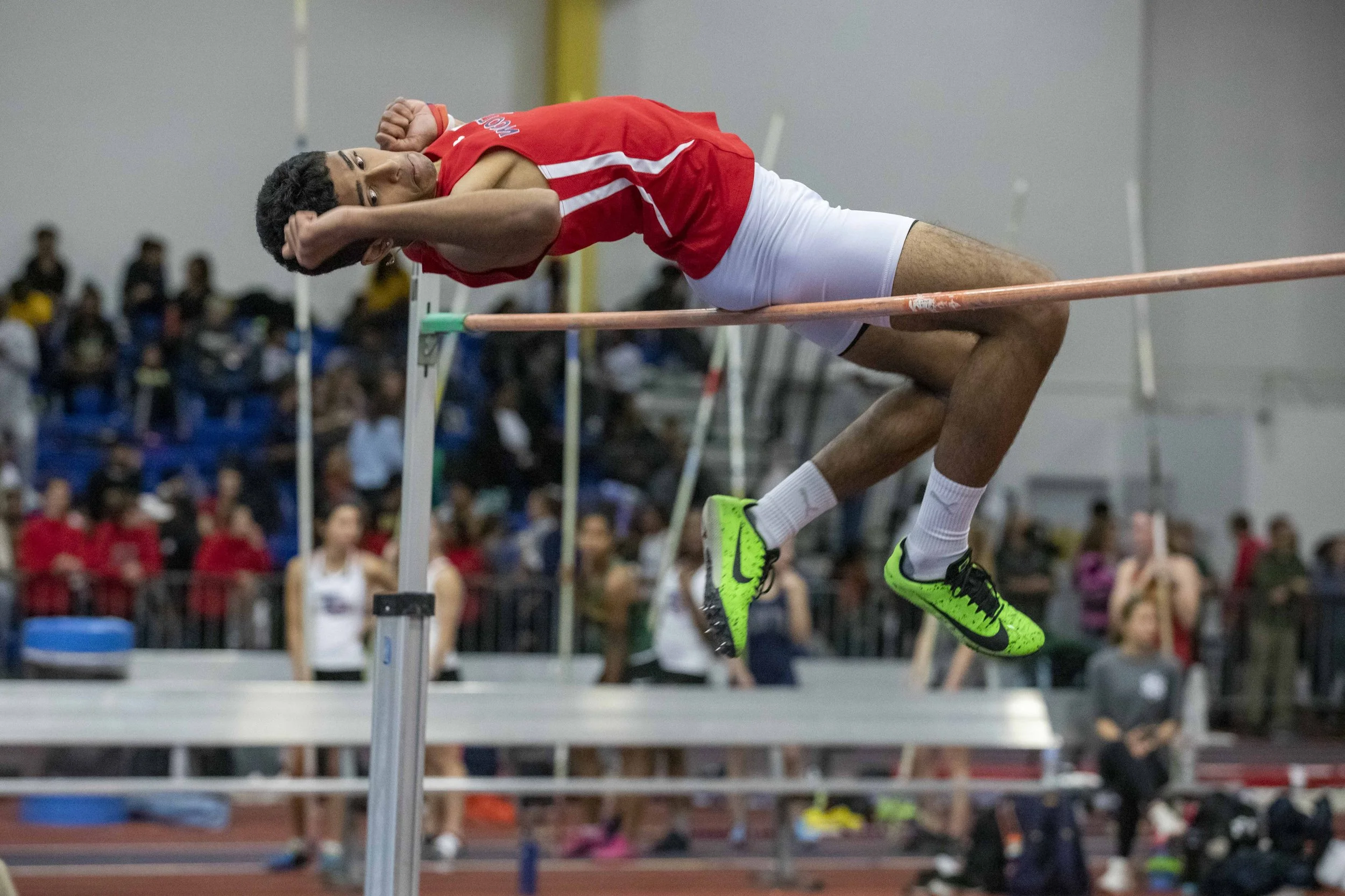  Anish Yarra of Thomas S. Wootton High School flies over the high jump at the Maryland 3A and 4A track and field championships, hosted at the Prince George's Sports and Learning Complex in Landover, Maryland, on February 22, 2023. (Amanda Andrade-Rho