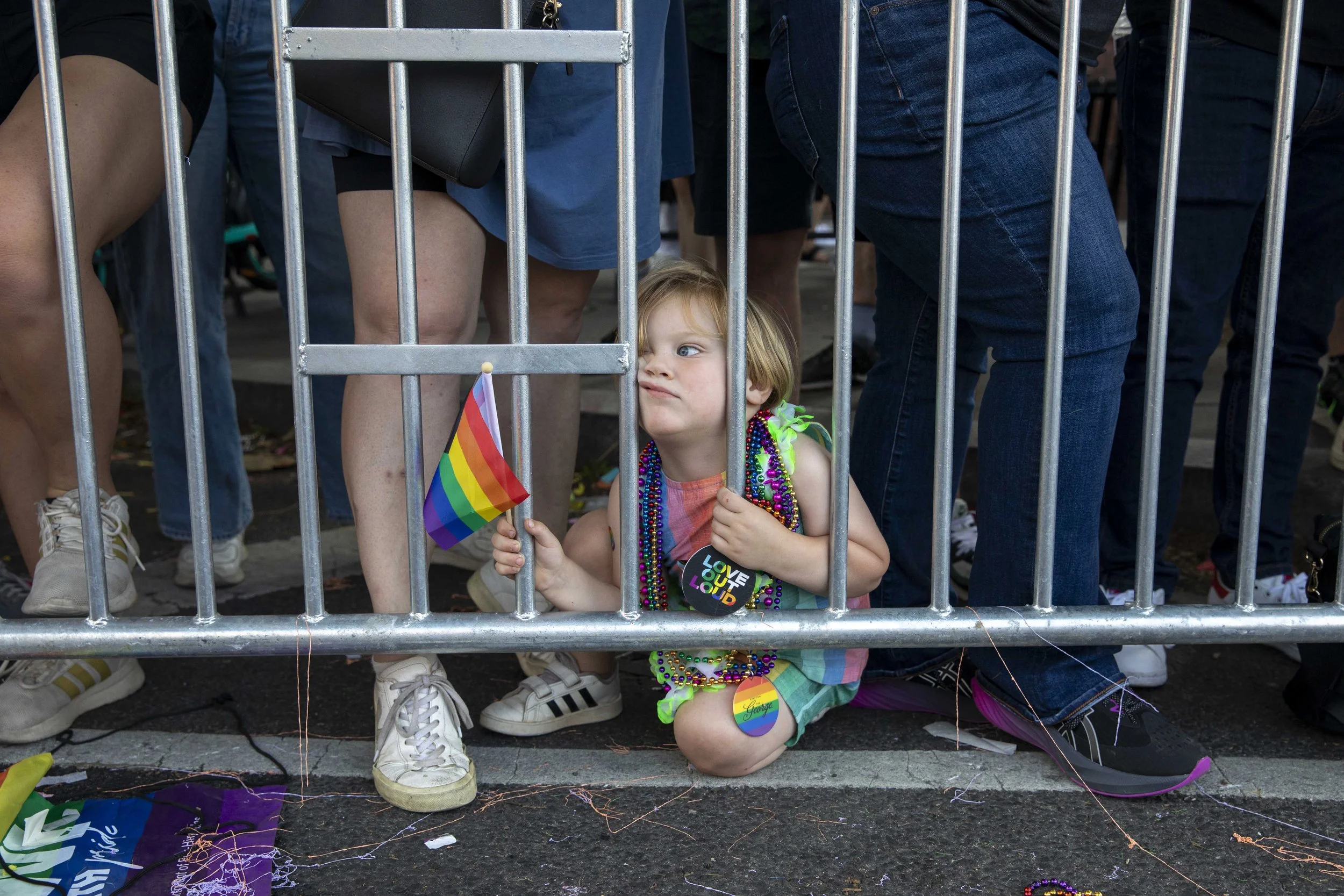  Rhodes Odendahl, 3, watches the Capital Pride Parade in Washington, D.C. on June 10, 2023. (Amanda Andrade-Rhoades/For The Washington Post) 