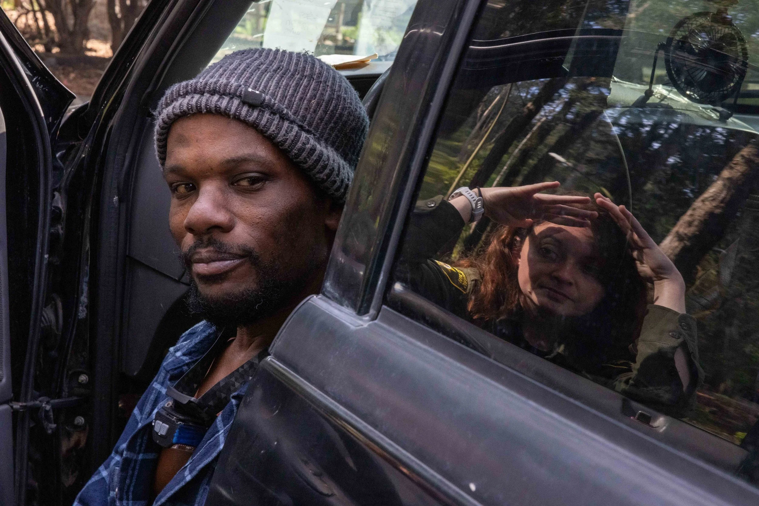  Barrows talks to Morrisette about his need to go to the DMV by his car Stern Grove. Barrows helped set up the appointment and told him that the cost would be covered by the city since he was considered low income. (Amanda Andrade-Rhoades/The San Fra