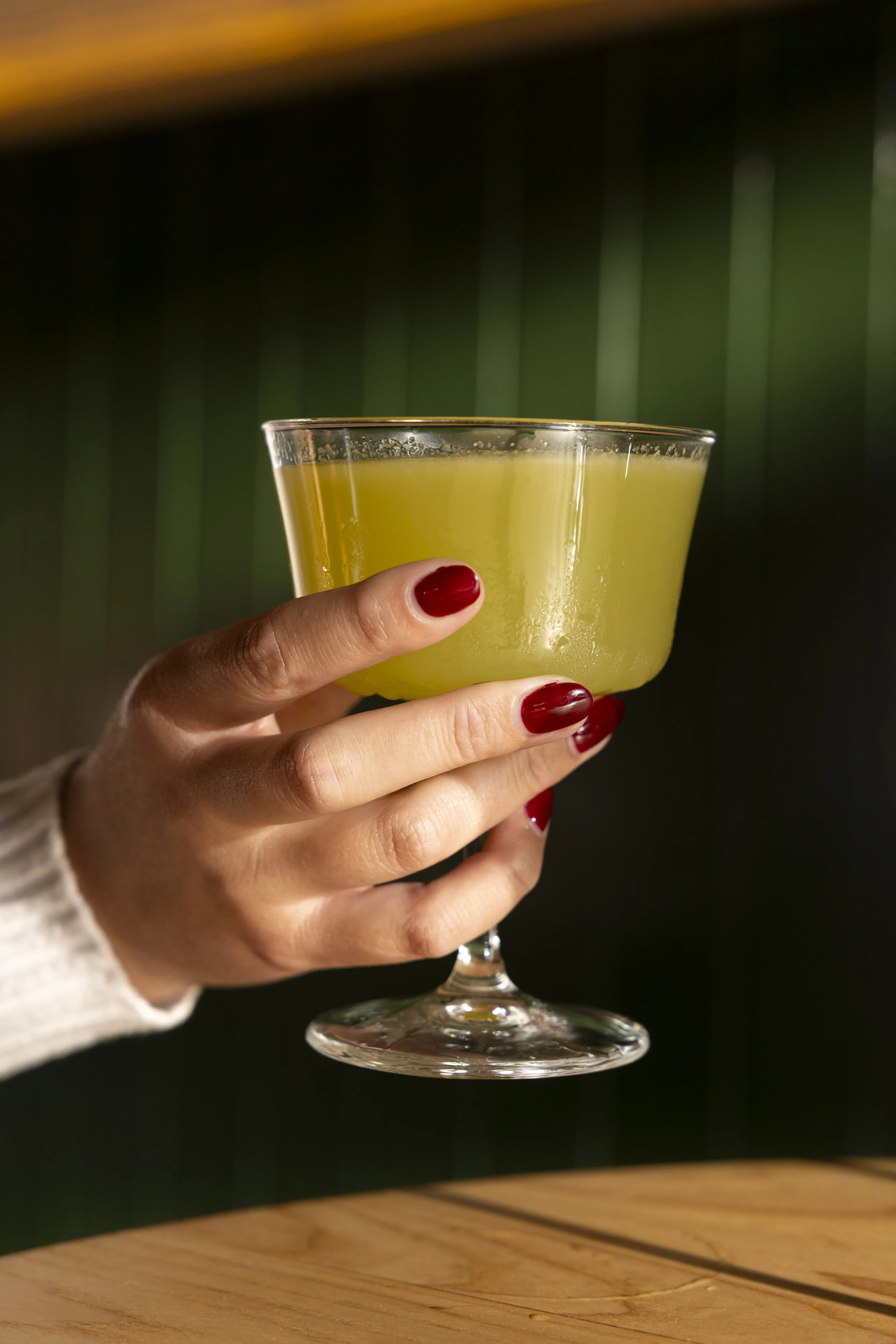  The appletini is seen at Tallboy in Oakland on Aug. 22, 2024. Tallboy has wooed fans with its extensive martini menu and vegan hotdog selection. (Amanda Andrade-Rhoades/The San Francisco Standard) 