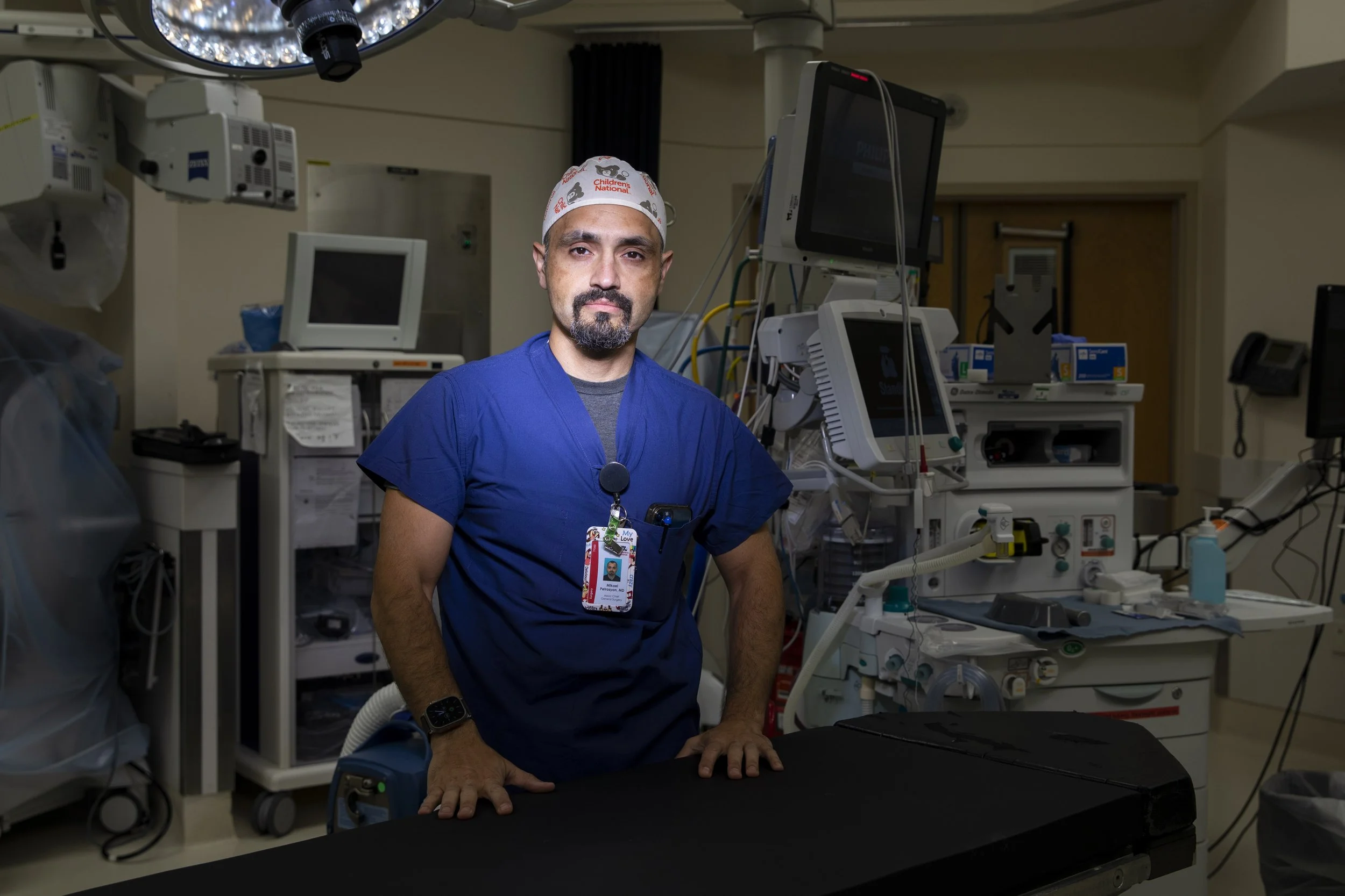  Dr. Mikael Petrosyan poses for a portrait in a surgical suite at Children’s National Hospital in Washington, D.C. on April 19, 2023. Dr. Petrosyan was a part of the effort to save Antonio Cheadle’s life after he was shot in October. (Amanda Andrade-