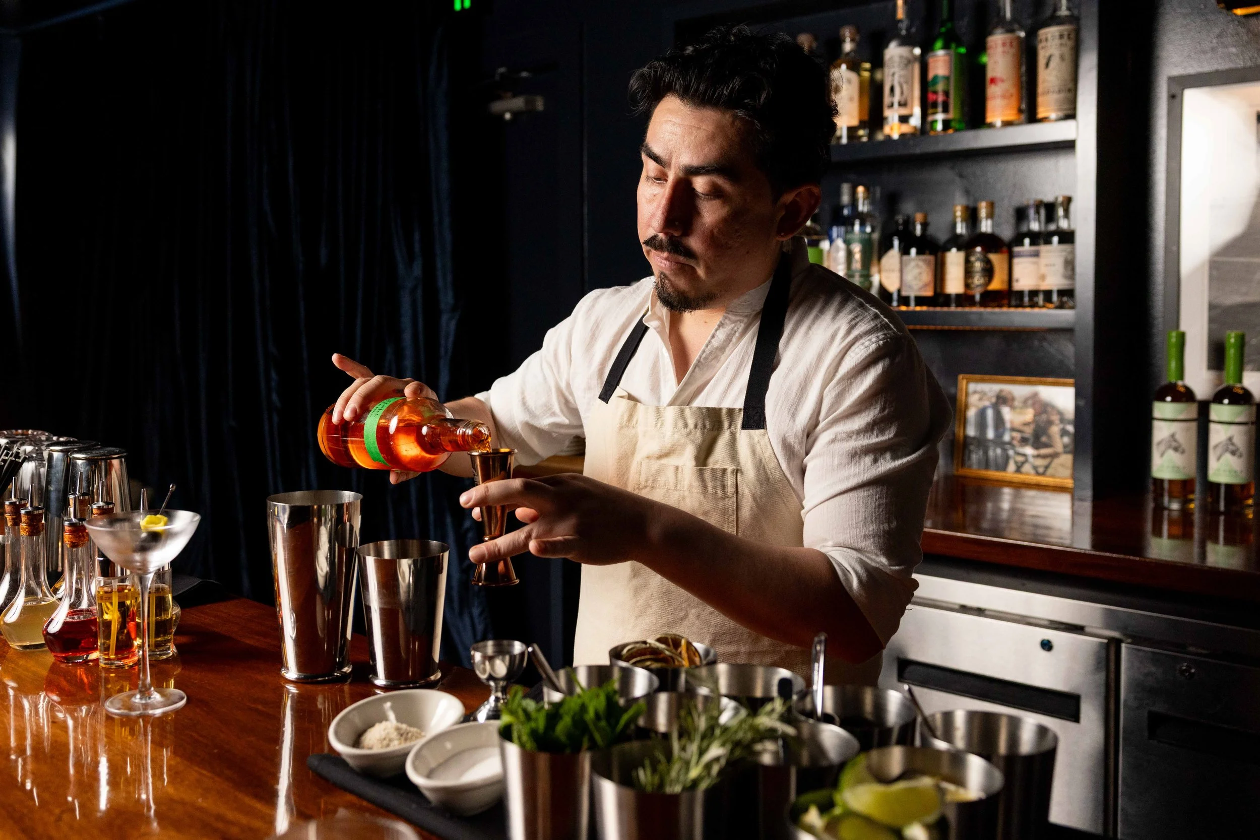 Raúl Ayala makes a cocktail known as “the most exciting man in the room” at Park Tavern in San Francisco on April 9, 2025. (Amanda Andrade-Rhoades/The San Francisco Standard)