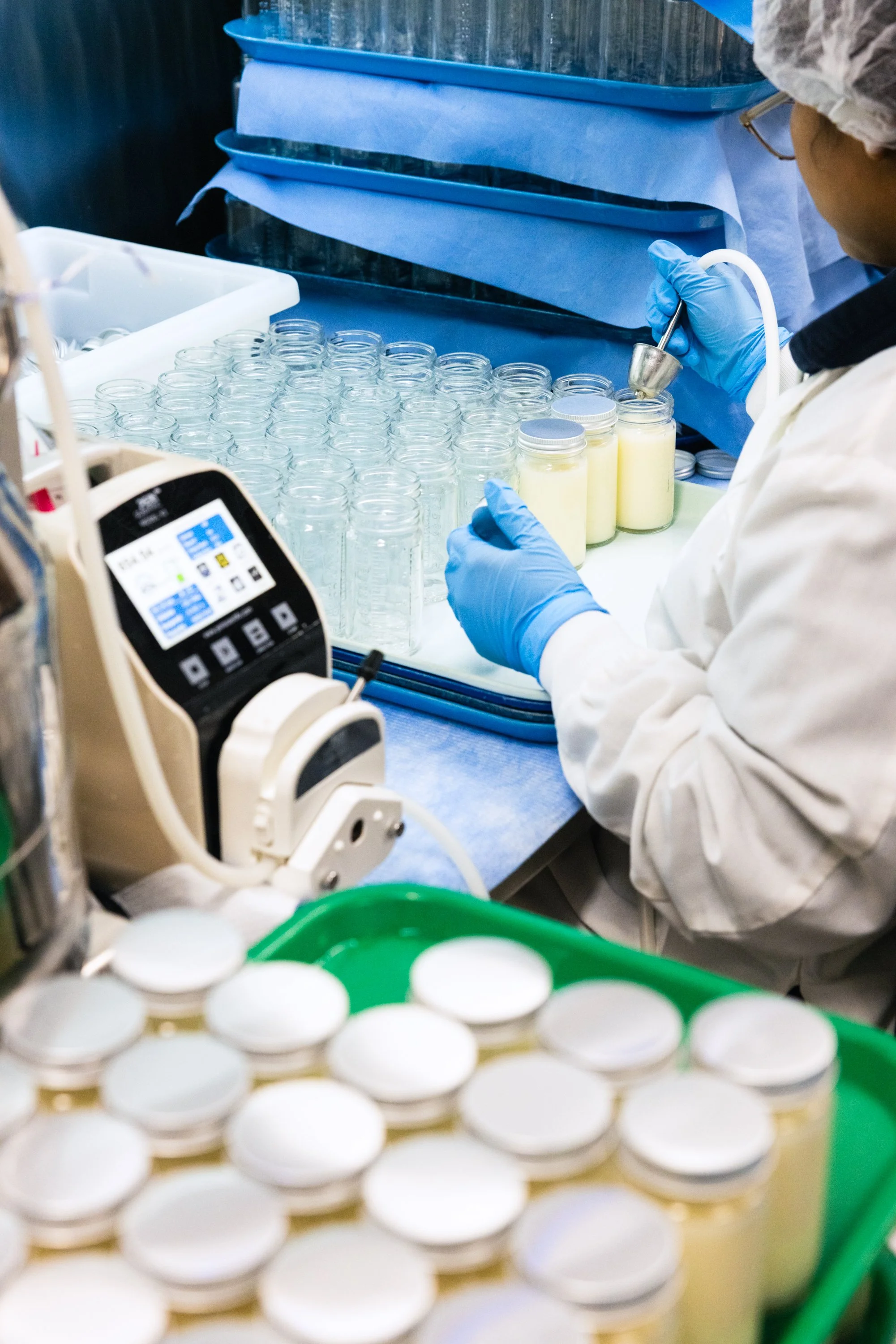 Glass containers are filled with a blend of donated breast milk at the Mothers’ Milk Bank California in San Jose on September 26, 2024. (Amanda Andrade-Rhoades/The San Francisco Standard)