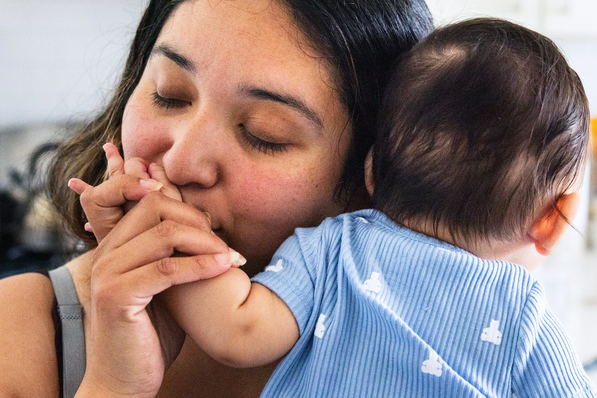 Magali Hernandez kisses her son Franco Ramirez at her home in San Francisco on September 24, 2024. (Amanda Andrade-Rhoades/The San Francisco Standard)
