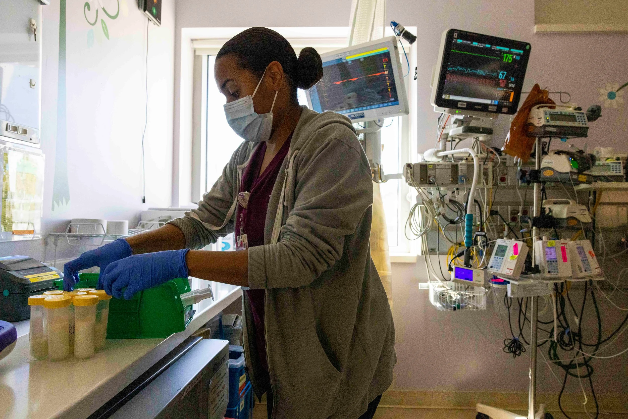 Brittni Russell stores Jessica Bruce’s breast milk in the neonatal intensive care unit (NICU) at Santa Clara Valley Medical Center on September 26, 2024. The NICU often offers donated breast milk as an option for newborns who are suffering from heal