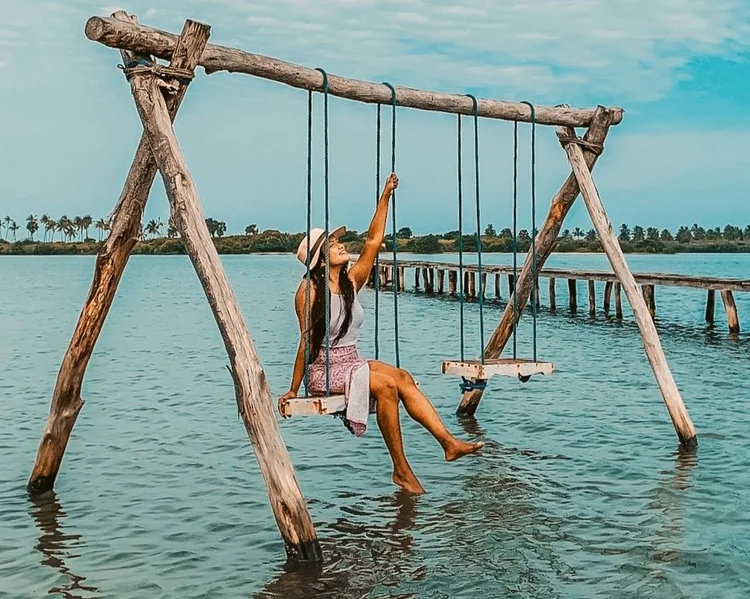 A guest on a swing at Ruuk Village, Kalpitiya