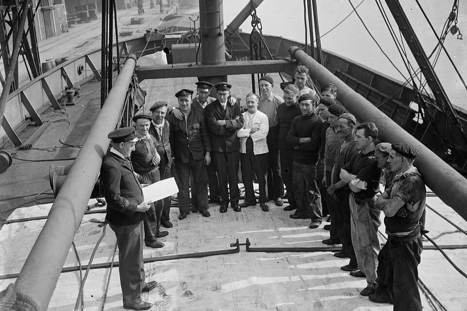 SS Eston crew being briefed by their Captain