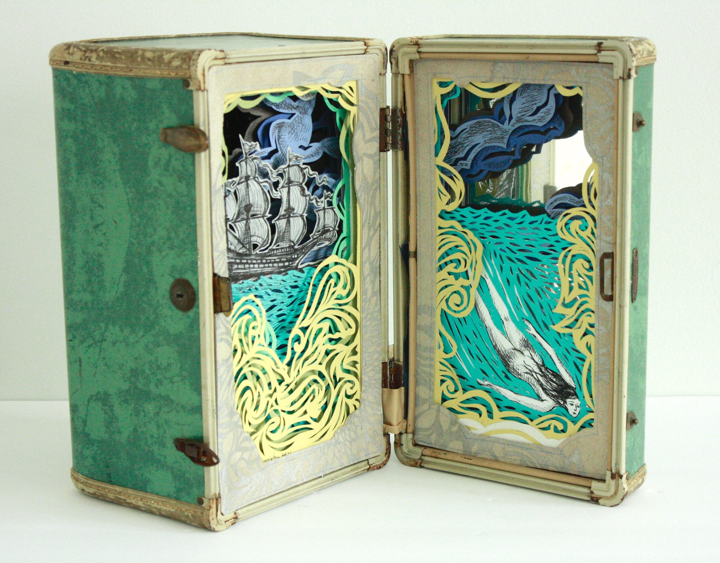 "Overboard," tunnel book in vintage suitcase, 14"h x 16"w x 6"d, 2021
