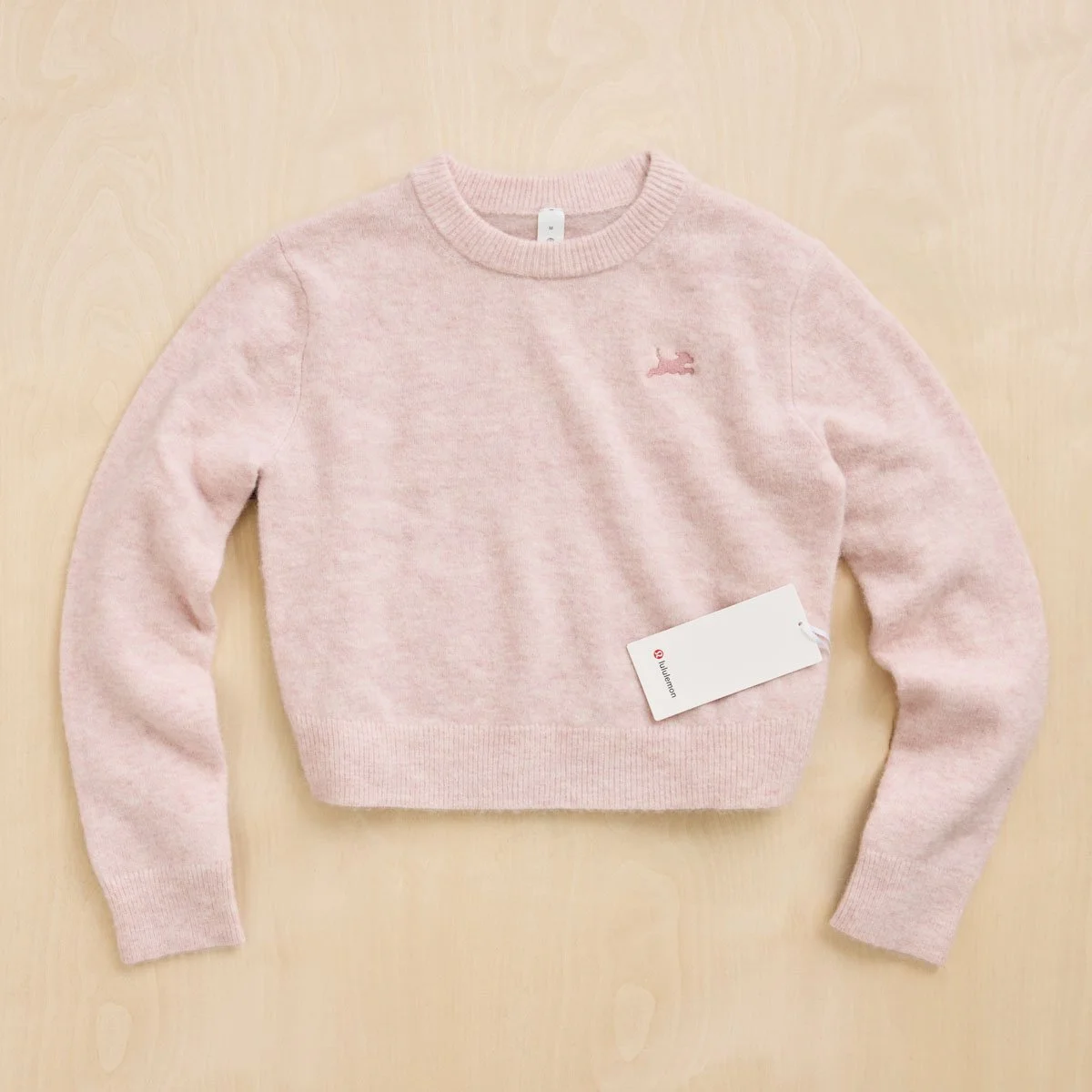 Fetch_InternalMerch_Lululemon-Sweater_Pink_Front.jpg