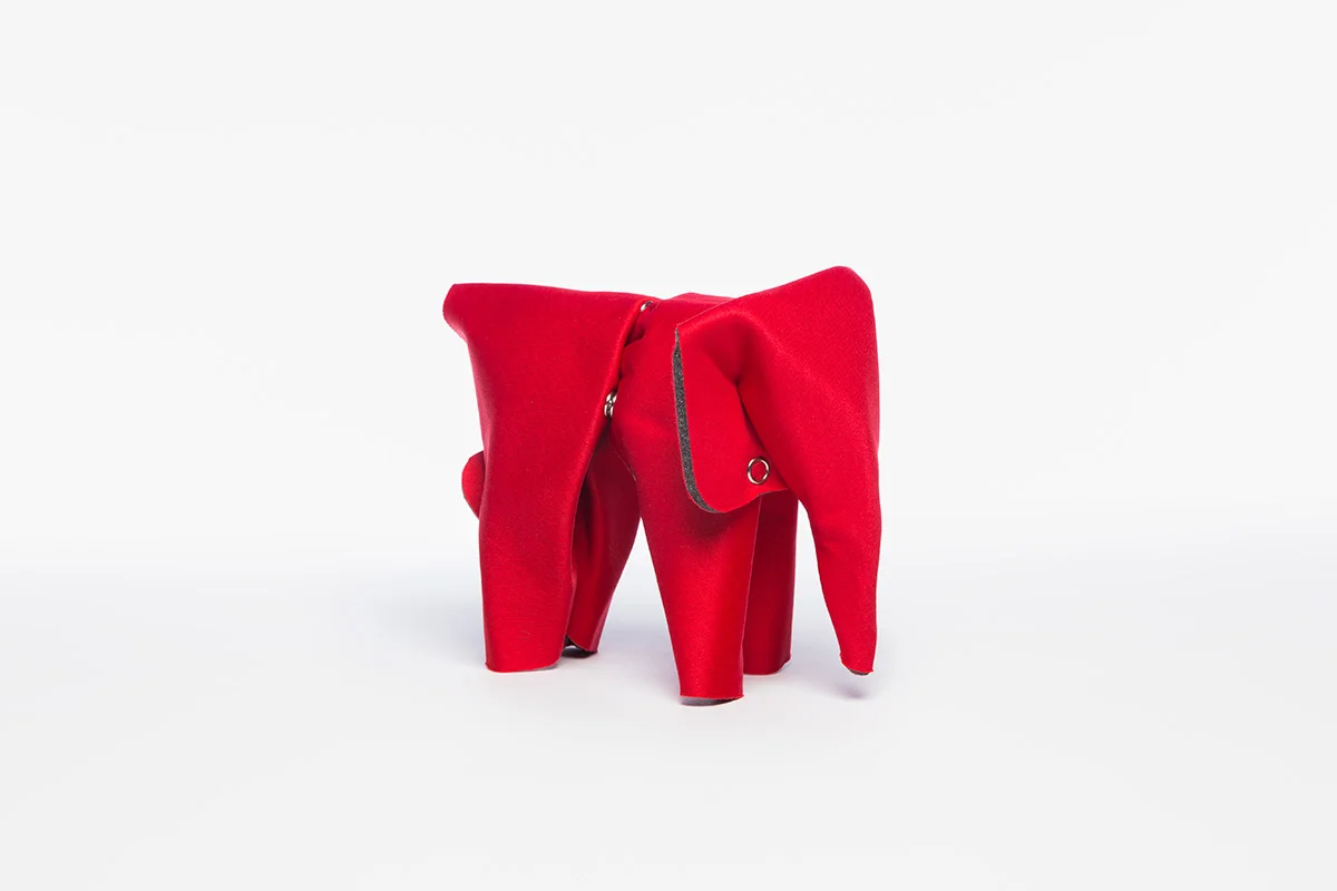 An elephant, gorilla, and bat make up The Flat Pack , a series of animal fold-ups. Soft, flexible squares and rectangles transform into animal figures as they take shape in three dimensions. Each piece is formed simply by a unique pattern of snaps. They offer children the challenge and reward of discovering hidden forms through tactility.