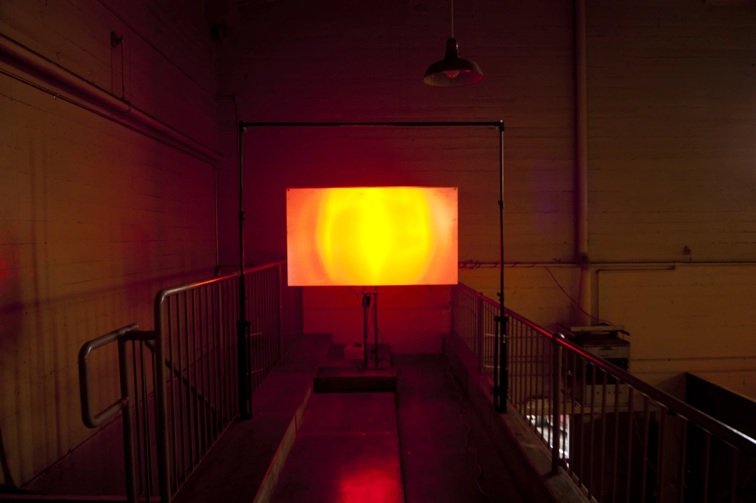 AMARILLO-ORO-FU EGO (2012) Neon light, Fresnel Lens. First of three installations. Neon tube fabricated by Kevin Chong.