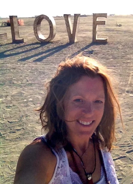  At Burning Man, doing my morning dance in front of LOVE