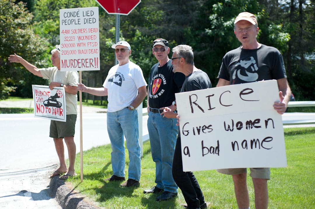 Protesters gather at the Norwich University entrance.
