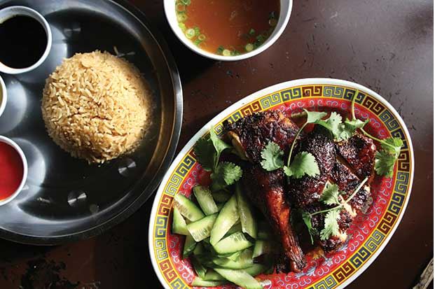 Nasi Ayam: roasted bone-in chicken, rice cooked with chicken stock, cucumber, green onion, cilantro, chili lime sambal, soy with sesame and fresh pounded ginger, from Kedai Makan on Capitol Hill
