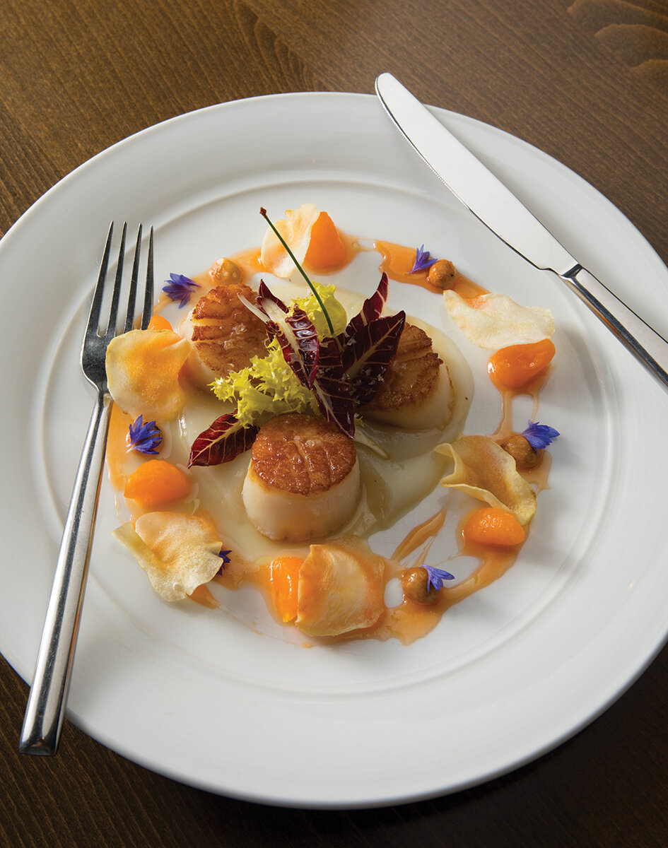 TO PERFECTION: Copine’s sea scallops arrive with an optimal sear
