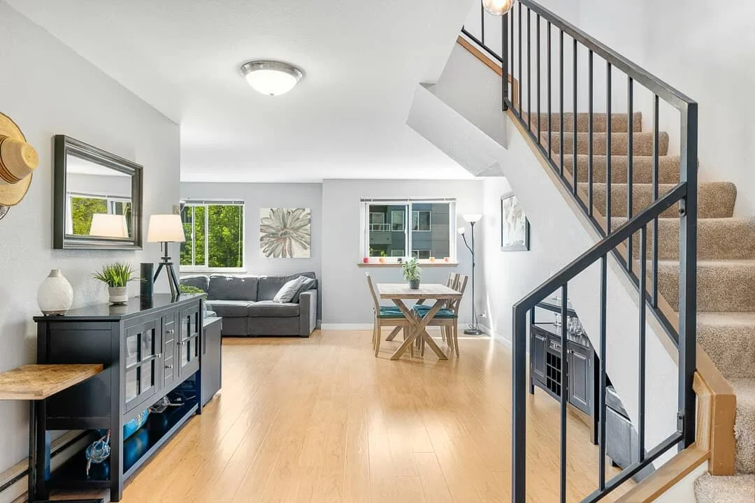 JUST LISTED!!! Rare, top floor, two story townhouse alternative in the heart of Ballard. Great space to create multiple entertaining areas. Private roof top deck just in time for summer barbecuing. Dedicated parking and storage unit in secured garage