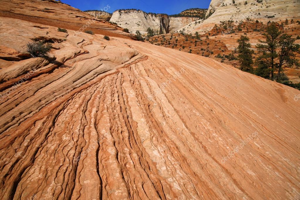 depositphotos_9799539-stock-photo-wave-rock-formations-in-zion.jpg