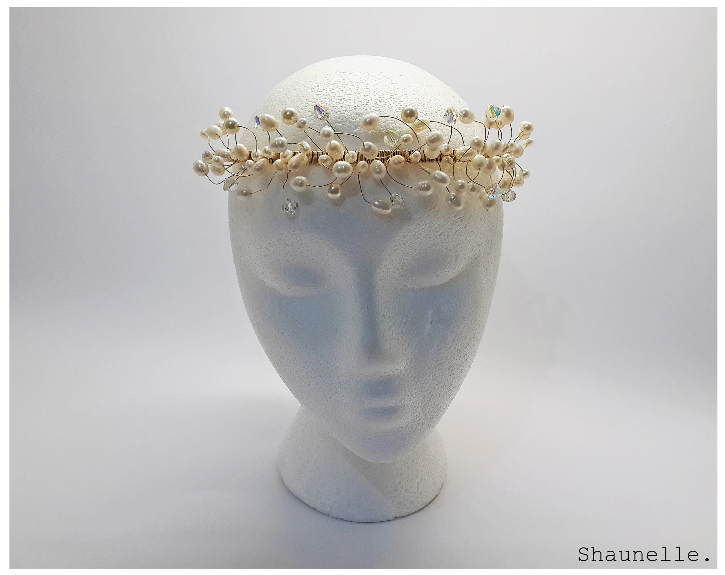 Bridal headpiece was handmade using a mix of Swarovski crystals & pearls and cultured pearls. 