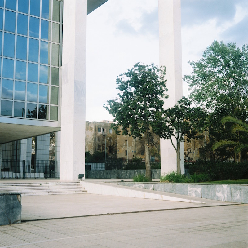  The Prosfygika estate can be seen through the modern archway of the Courts of Justice next door. 