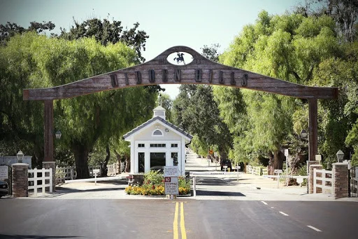 The Long Valley entry gates at Hidden Hills hearken back to its equestrian beginnings