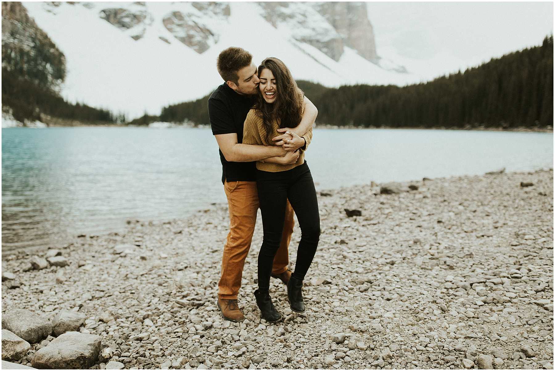 A fun, laid-back, adventurous couples shoot at Lake Moraine in Banff National Park