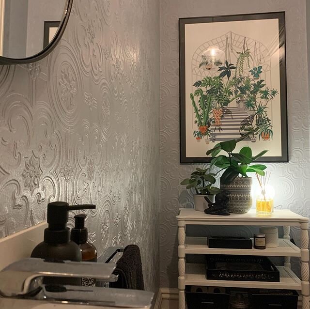 What a difference wallpaper makes. Wallpaper was used in this powder room to give the impression of original pressed metal. Thank you to @cuttingedgewallpapering for helping us transform this space.