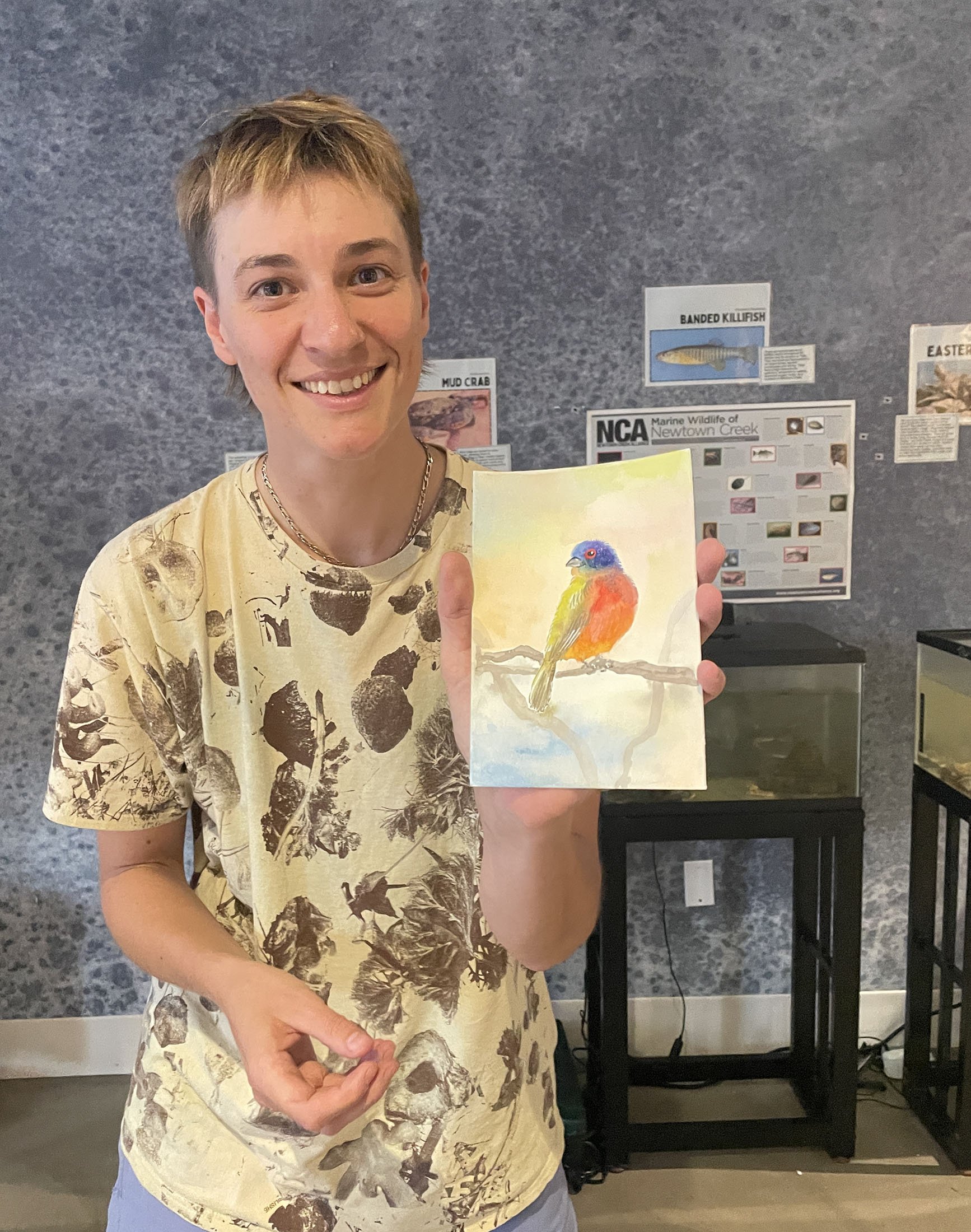 Student with bird painting, bird migration class